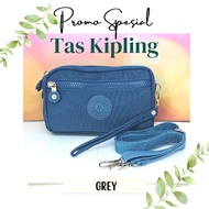 Tas dan dompet kipling selempang .