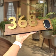 DECOR HOUSE NUMBER PLATE with Doorbell. House number of 304 stainless steel legs. Wood grain rolled 