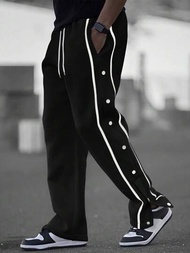 Manfinity Homme 男士寬鬆運動長褲,側邊配對比色膠帶和鈕扣設計,腰部有拉繩