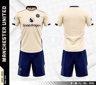 Bộ Thể Thao Bóng Đá MU Kem Mẫu 2025-2026