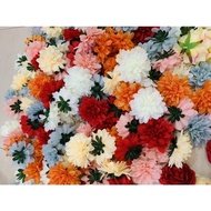 Dahlia flower heads decorate cake towers and water towers