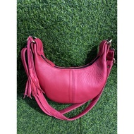 Sheepskin crescent bag