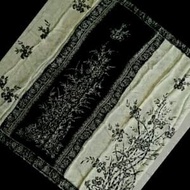 Kain batik sutra hitam putih