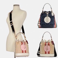 Coach Dempsey Drawstring Bucket Bag In Signature Jacquard With Stripe And Coach Patch