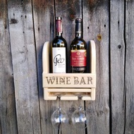 Natural wood hanging bottle shelf with glass holder. Wine rack mini bar.