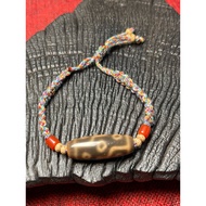Golden brown Tibetan 9-eye dzi bracelet