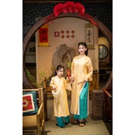 High quality orange-yellow metallic silk, metallic brocade with delicate embossed patterns