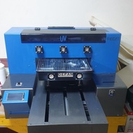 Mesin UV flarbet (riecat alfa gen3) +mesin laminasi