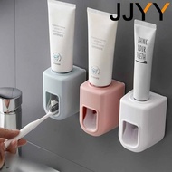 Jjyy เครื่องจ่ายยาสีฟันอัตโนมัติติดผนังอุปกรณ์ในห้องน้ำที่บีบยาสีฟันกันน้ำเครื่องมือที่วางแปรงสีฟัน