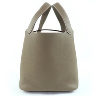 全新愛馬仕 Picotin Lock MM22 Taurillon Clemence Etoupe 皮革手提包，金色五金配件，K 字印記，附原廠盒和防塵袋，法國製造