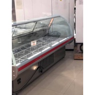 Curved meat display chiller