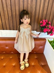 Váy bé gáiváy tiểu thư màu kem đính nơ cực xinh cho bé D125