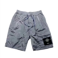 Stone Island รุ่นที่ถูกต้องหินหินโลหะไนล่อนป้ายการทำงานร้อยชุดทำงานกางเกงขาสั้นชายกีฬากันน้ำกางเกงห้