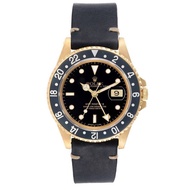 Rolex Rolex GMT Master II (Reference 16718). A yellow gold automatic wristwatch with date. 1991