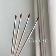 Silver-handled eye cavity and puffiness removal brush number 4