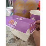 BTS Meal Cajun Sauce + Sweet Chili Sauce with empty BTS cup and BTS boxes
