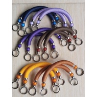 Code 22, a pair of ropekur bag handles, Mote combination, bag handles