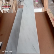 granit plain/list dinding 10x50,10x60 putih motip glossi