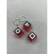 Clicky Squid Game keychain, relaxing click