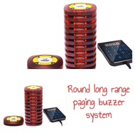 Round long range paging buzzer system