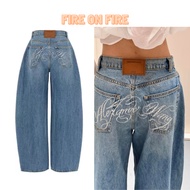 Women's blue wash low-rise jeans with flared stones flared jeans low rise jeans