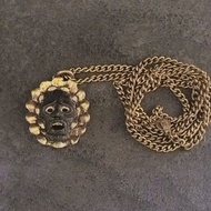 Brass Mask necklace by GRYPHON