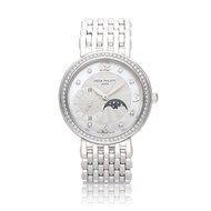 Patek Philippe Calatrava Reference 4958/1G-001, a white gold manual wind wristwatch with moonphase