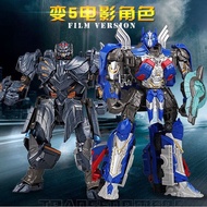 H6001 ซีรีส์   ของเล่นแปลงร่าง Optimus Prime Hornet Roadblock โมเดลหุ่นยนต์รถทำมือเด็กชายคิงคอง