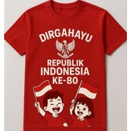 KAOS ANAK INDONESIA MENGIBARKAN BENDERA MERAH PUTIH /CUSTOM NAMA