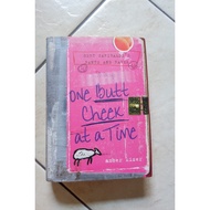 One Butt Cheek At A Time by Amber Kizer