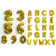 Gold letter and number balloons.AZ, 0-9.