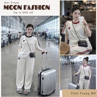 Women's gray airport outfit, active style, round neck t-shirt, comfortable loose long pants