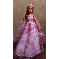 Barbie doll in Birthday Wishes collector dress