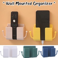 Multifunctional wall mounted remote storage box for mobile phones.