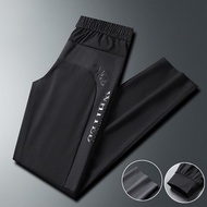 【Ready Stock 】2022 NEW Seluar Track Lelaki Slim Fit tracksuit seluar slack lelaki Resilient Ice silk quick drying pants Air conditioning pants M-5XL Men's Basic pants