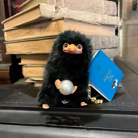 Universal Beijing Resort's Magic Academy Pet - Black Niffler Holding a Ball Plush Keychain, Backpack