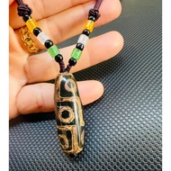 9-eye Tibetan dzi necklace - endless energy source