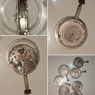 Mesin Jam Tangan Swiss made manual winding Fiture Hari dan Tanggal ukuran sedang 21 Jewels CROWN kuning