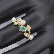 14k gold ring with emerald, pearls and diamonds.