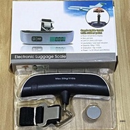 UPGRAD  ตาชั่งพกพา หน้าจอ LCD รุ่นะมีตะขอสำหรับเกี่ยวกระเป๋าเดินทาง ชั่งน้ำหนักได้ 10g-50kg คาขั่งมื