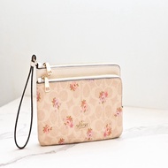 Coach 粉色小花點綴中長夾