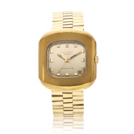 Movado Kingmatic "S", a yellow gold plated automatic wristwatch with date