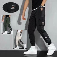 Classic Streetwear Casual Pants Men Ribbons Harem Jogging Pants Male Slim Fit Spring Cargo Pants Multi-Pockets Trouser Male