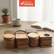 A wooden square round cup pad that is heat resistant and non-slip, perfect for use as a coaster or d