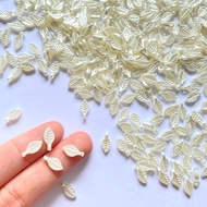 (15 grams of/ +- 250pcs) small white leaf beads | Leaf beads