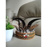 Mas mata god's feather crown. Papuan customs and Dayak customs