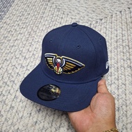 NAVY BLUE NEW ORLEANS PELICANS NBA TEAM LOGO 9SEVENTY SNAPBACK CAP/HAT BY NEW ERA