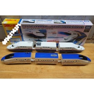 Box of 2 Takara tomy E4 and E7 battery-operated train models