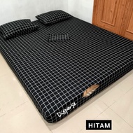 Homemade bed sheet with black grid motif 99