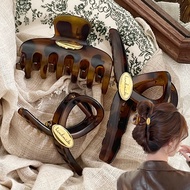 Korean Version of The Temperament Tortoiseshell Color Letter Ellipse Hair Clip Female